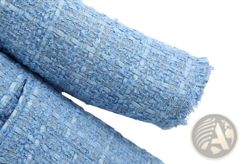 Women’s double breasted light blue textured tweed blazer fabric with woven slightly frayed edge detail