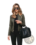 Black leather satchel bag with structured shape and top handle paired with women’s faux leather bomber jacket urban casual coat