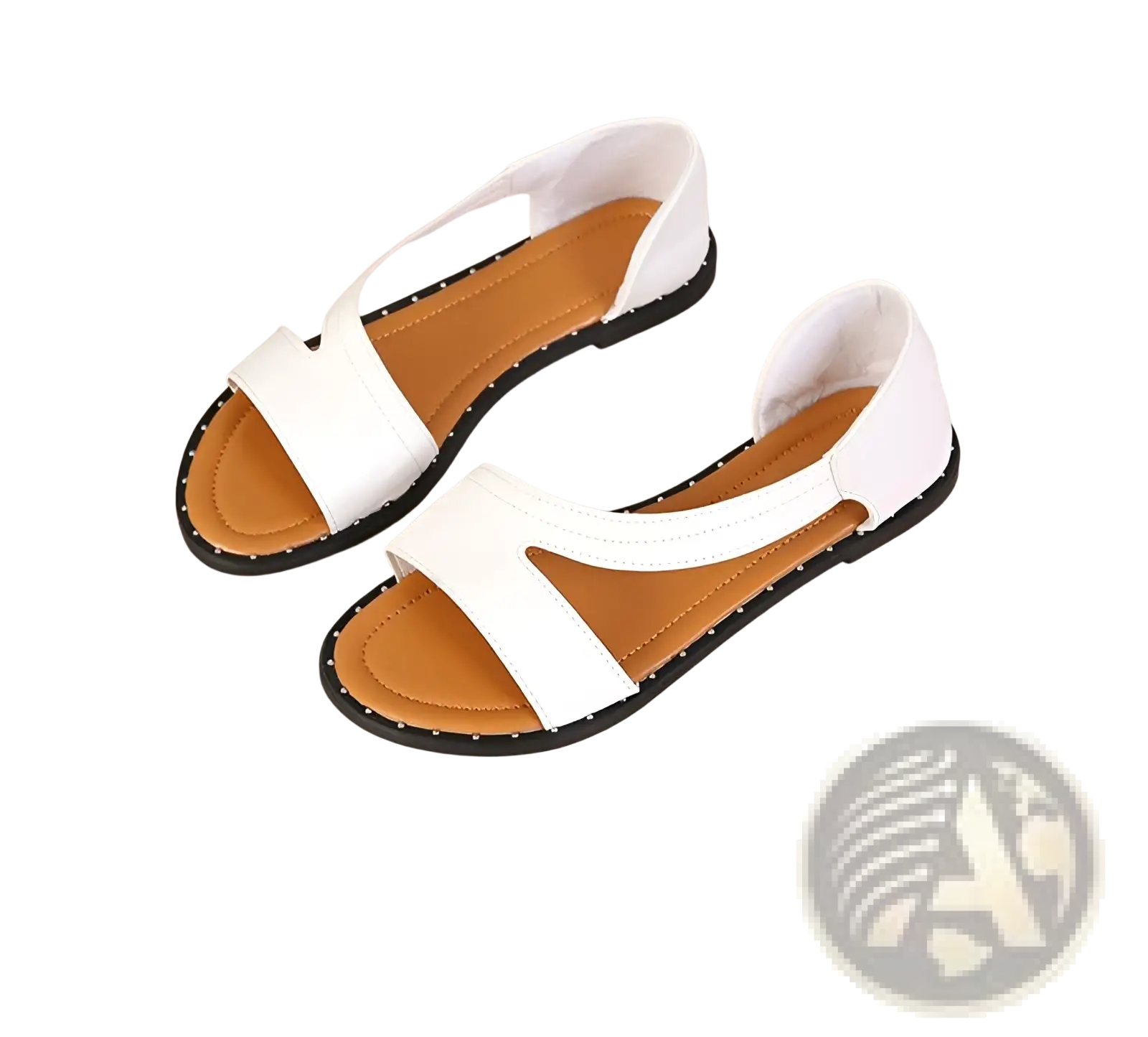 White leather women’s flat sandals with minimalist straps black rubber soles and tan insoles