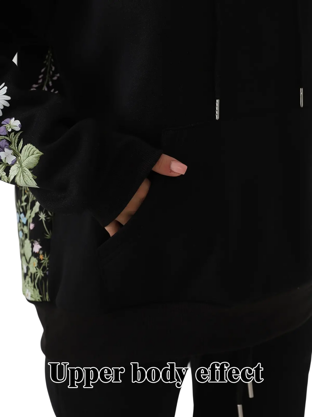 Black women’s long sleeve hoodie featuring intricate floral embroidery on the sleeve and side panel