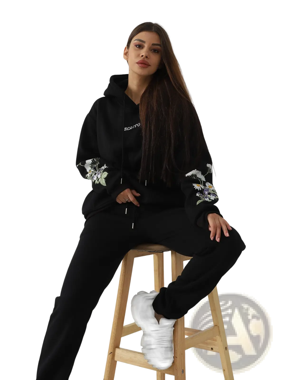 Black women’s long sleeve hoodie with white floral embroidery on sleeves and small scarf logo on chest