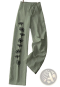 Olive green women’s wide leg cotton linen trousers with black embroidered daisy floral print down the side