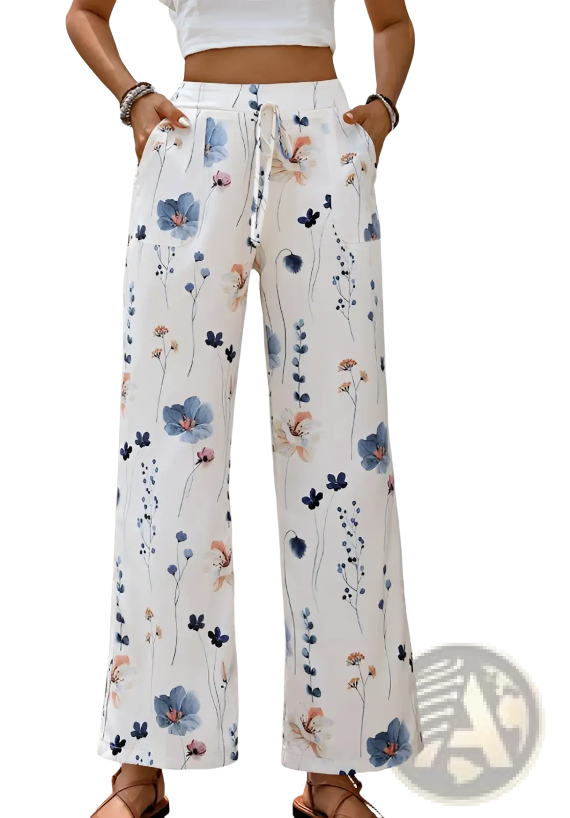 Women’s floral print cotton linen wide leg trousers in white with blue pink and orange blossoms on soft fabric