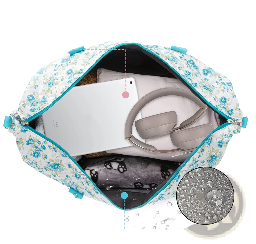 Women’s floral travel bag in teal and white with waterproof wet and dry separation duffel design and toiletry pouch