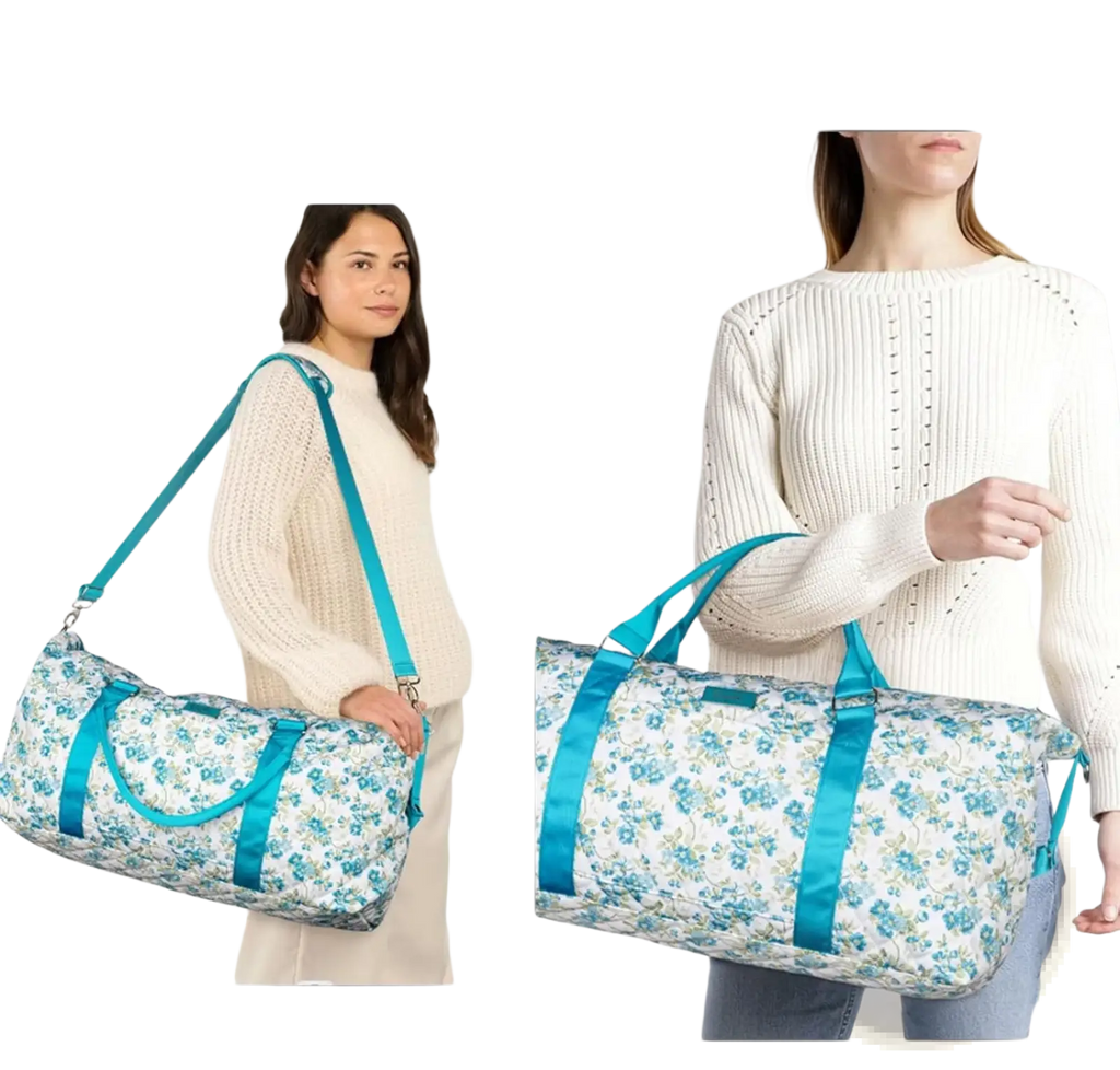 A quilted women’s floral travel duffel bag with delicate blue pattern and vibrant teal fabric straps and handles