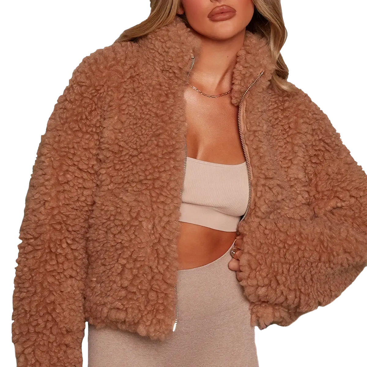 A cozy tan faux fur women’s fuffy shearling winter bomber jacket with plush texture and central zipper