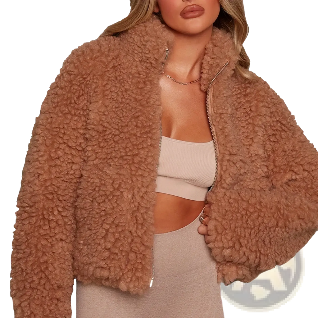 A cozy tan faux fur women’s fuffy shearling winter bomber jacket with plush texture and central zipper