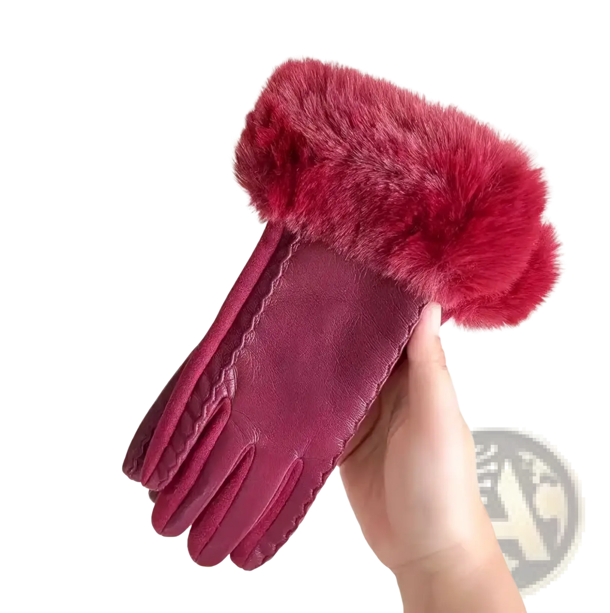 A pair of women’s fur-lined winter leather gloves in burgundy with vibrant red faux fur cuffs visible from the back side