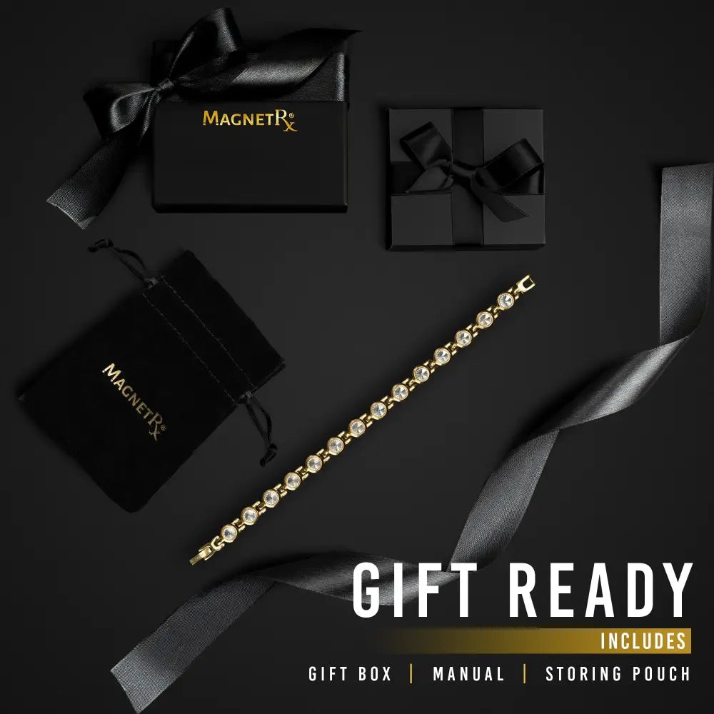 Women’s gold crystal magnetic therapy link bracelet with clear faceted stones in an elegant chain design