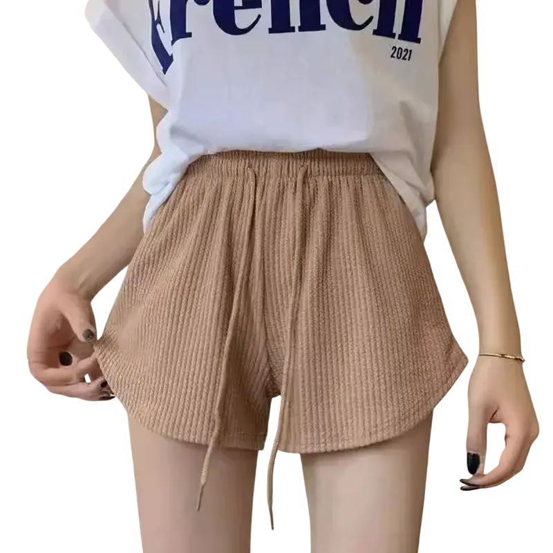 Beige knit shorts with a drawstring waistband featuring main fabric composition of soft corduroy for casual summer wear