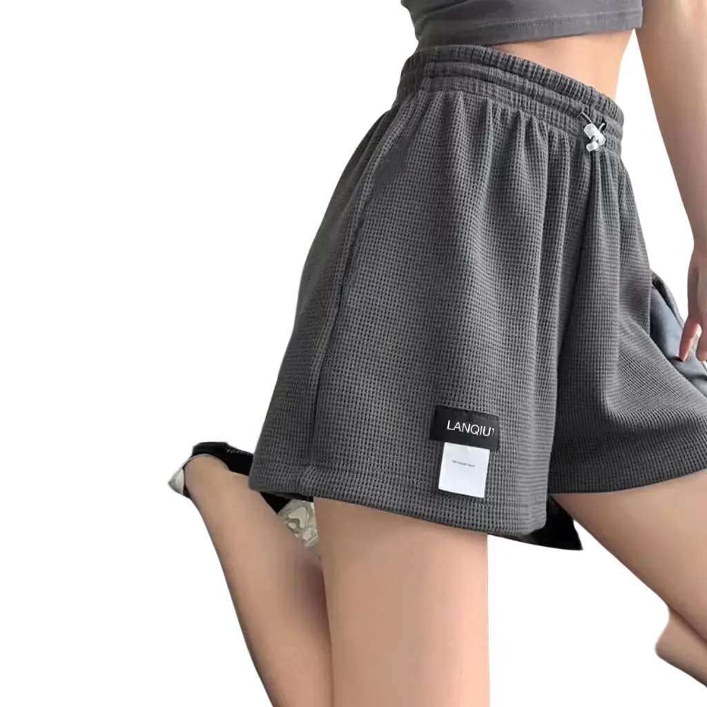 Women’s gray waffle knit shorts with lanqiu brand tag on side seam made from breathable main fabric composition
