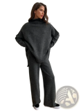 Women’s knit two piece sweater set featuring a cozy dark gray oversized knit sweater with high turtleneck and wide sleeves