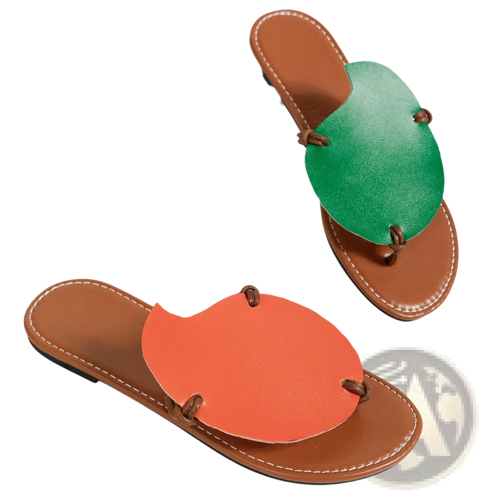 A pair of brown leather women’s casual flat slide sandals with vibrant orange and green leaf design accents