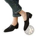 Black leather loafers for women with a pointed toe and low block heel perfect for formal and casual wear