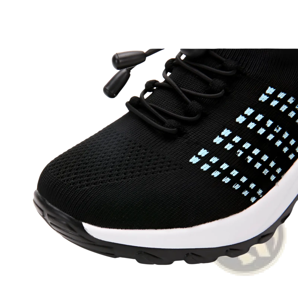 Women’s lightweight fly knit casual sneaker in black with light blue embroidered patterns and a white midsole