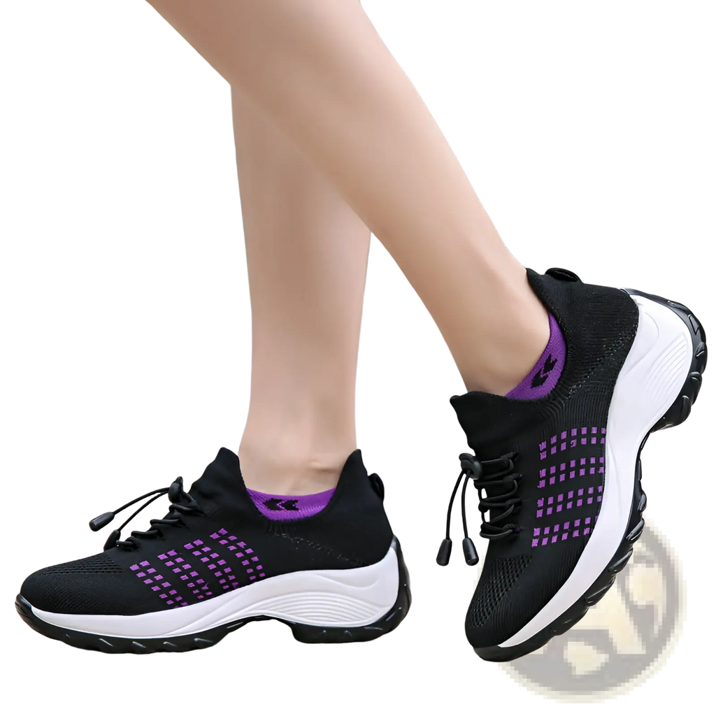 Women’s lightweight fly knit casual sneakers in black and purple with white midsole and chunky rubber outsole
