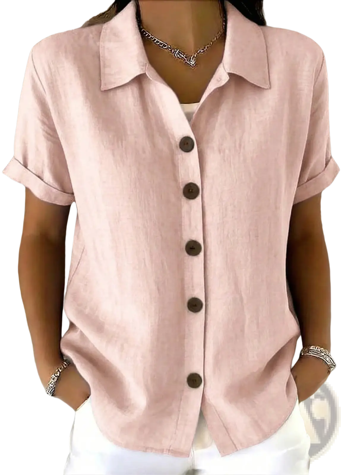 A soft pink women’s linen blend short sleeve shirt with collar and rolled cuffs for casual wear