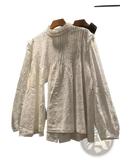 White textured women’s long sleeve blouse with stand collar and ruffled sleeves for elegant wear
