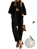 Women’s loose casual black oversized jumpsuit with wide sleeves and large front pockets for everyday wear