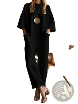 Women’s loose casual black oversized jumpsuit with wide sleeves and large front pockets for everyday wear