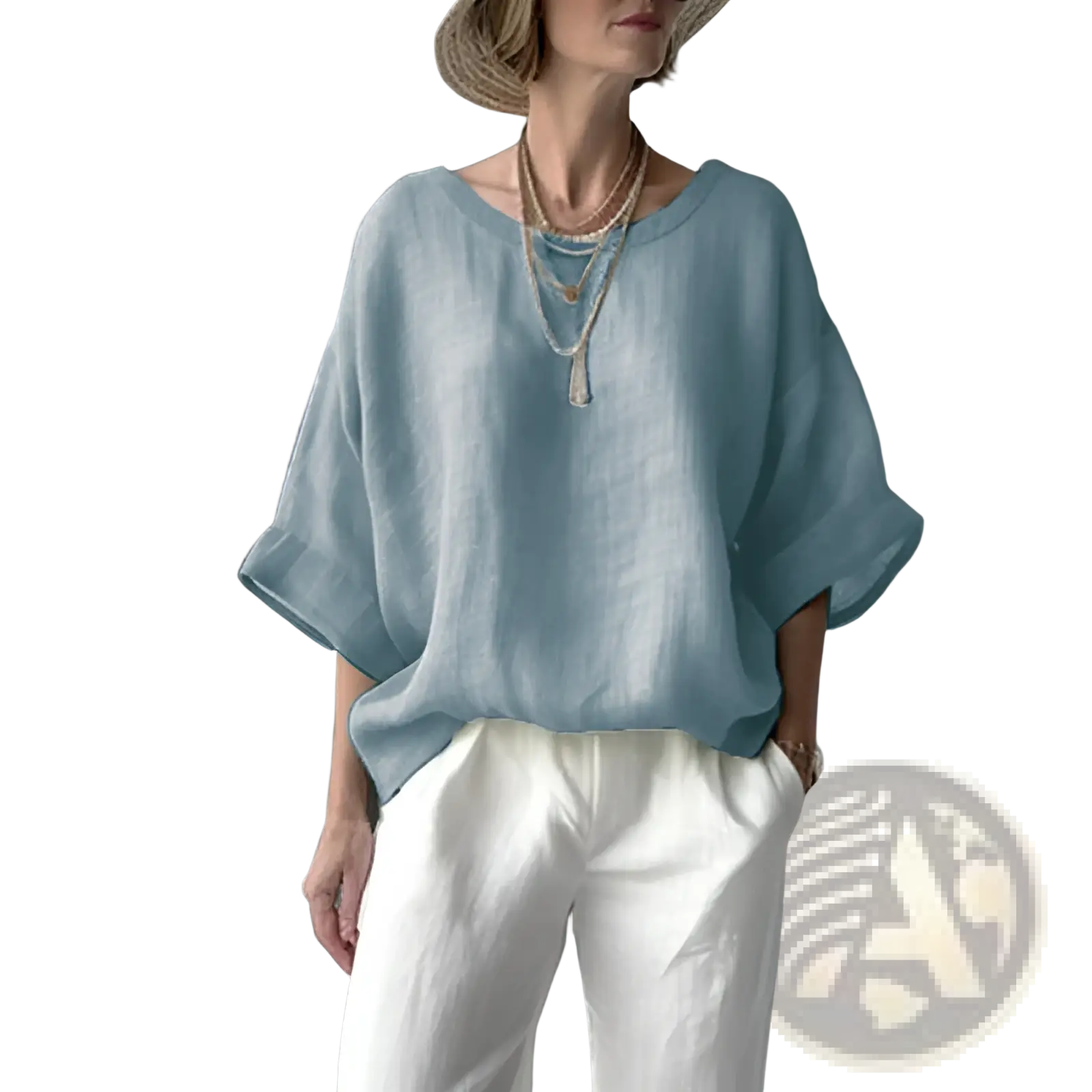 Light blue loose linen blouse with wide sleeves and drop shoulder for a relaxed and comfortable fit