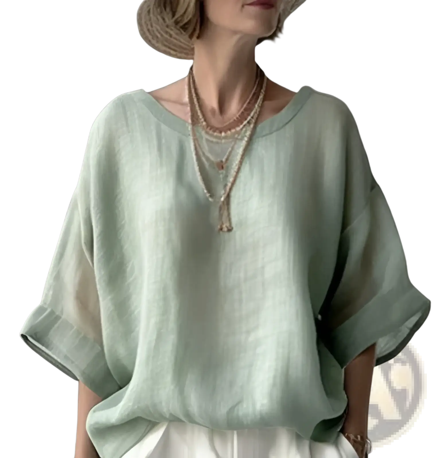 Light green loose linen drop shoulder blouse with wide sleeves and soft flowing silhouette for women