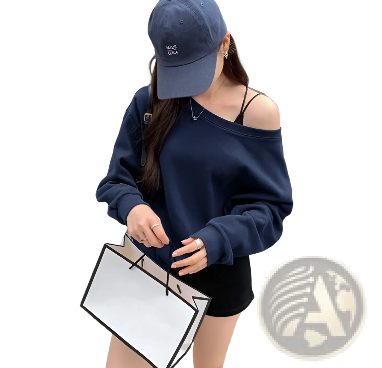 Navy blue women’s loose off shoulder ribbed knit sweater with long sleeves and ribbed cuffs