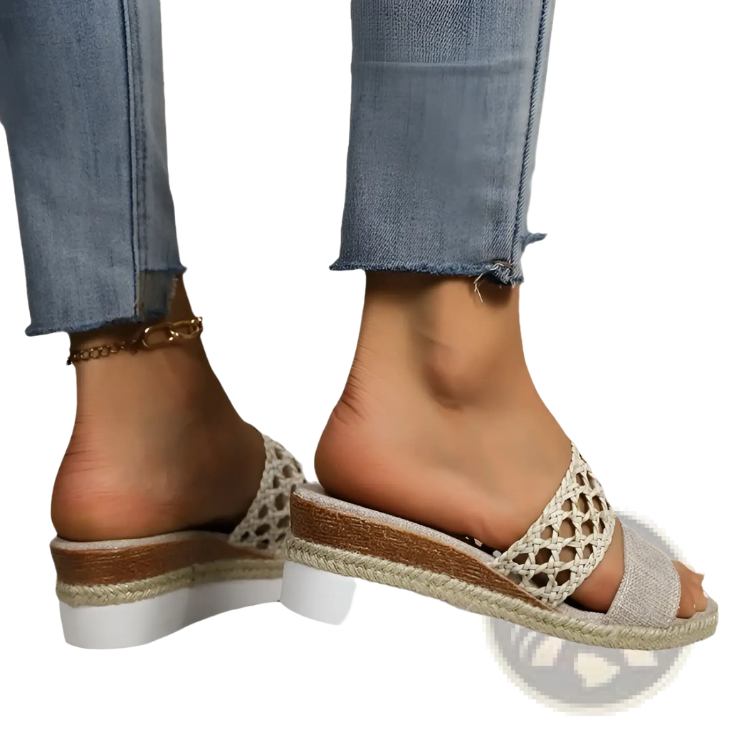 Women’s beige mesh espadrille platform wedge sandals with braided rope sole and white rubber heel visible from the back
