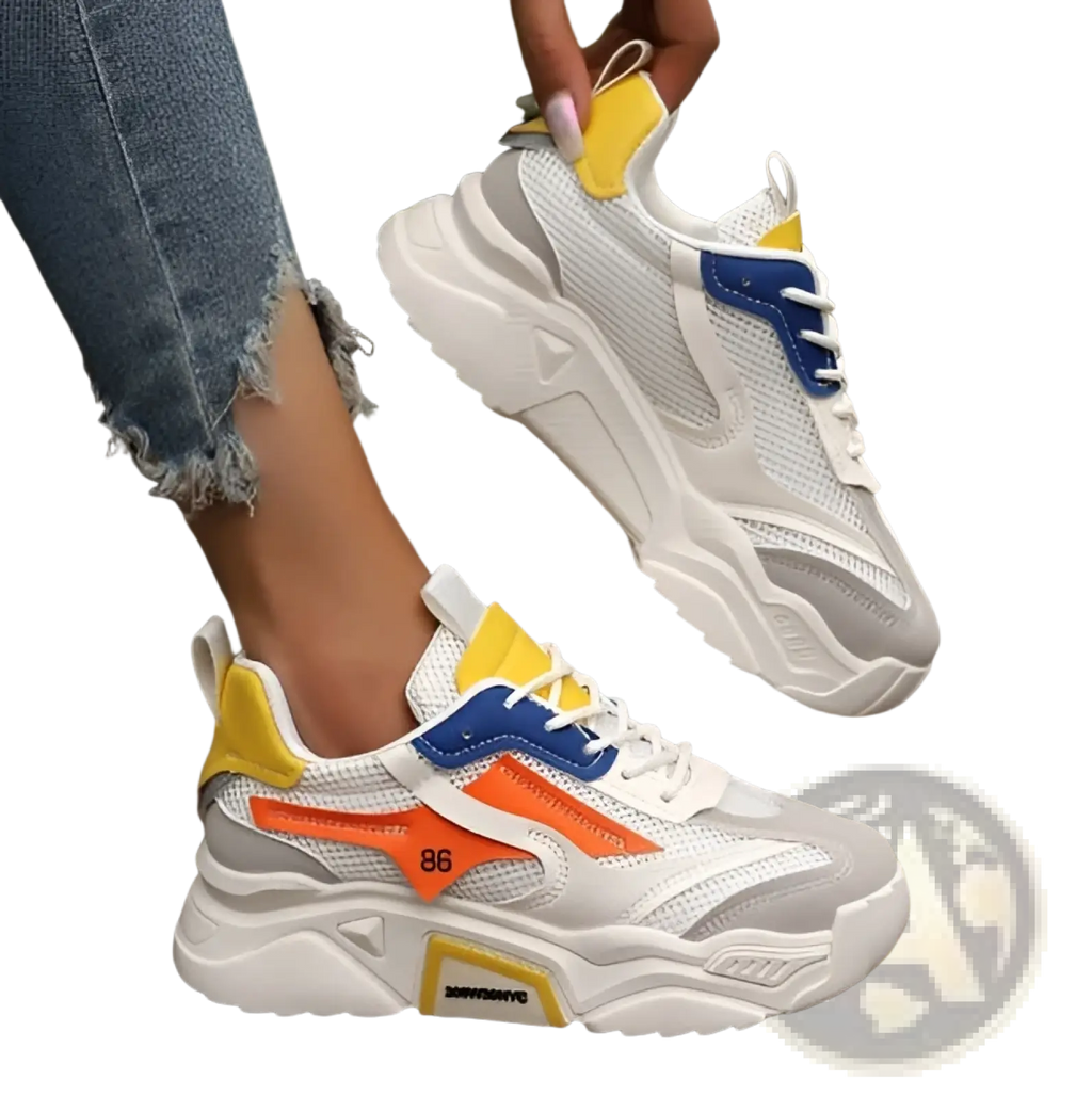 Womens breathable mesh platform sneakers in white and gray with yellow blue and orange chunky accents on the sides and heel