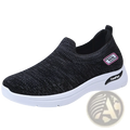 Black mesh knit slip-on women’s sneaker with white rubber sole and pink-accented logo for comfort wear