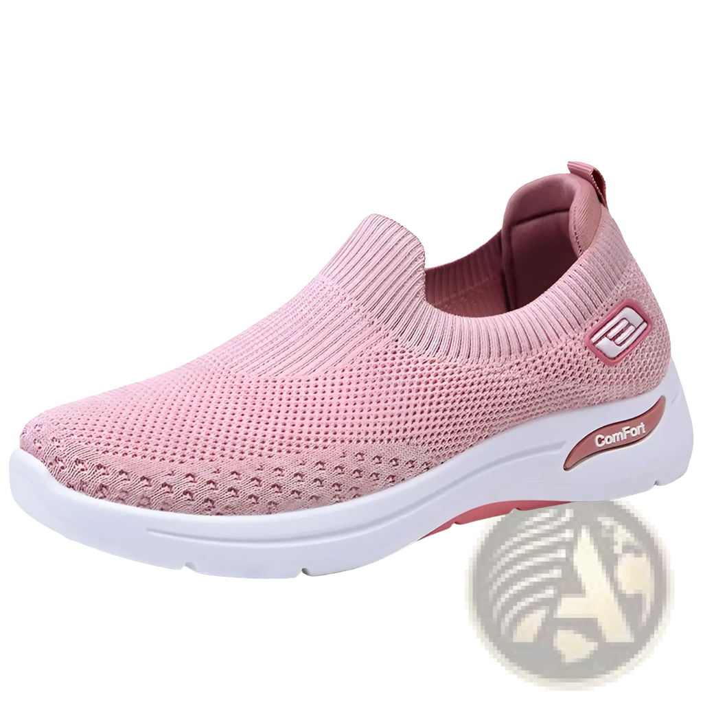 Pink women’s mesh slip on knit comfort sneaker with white rubber sole and comfort branding