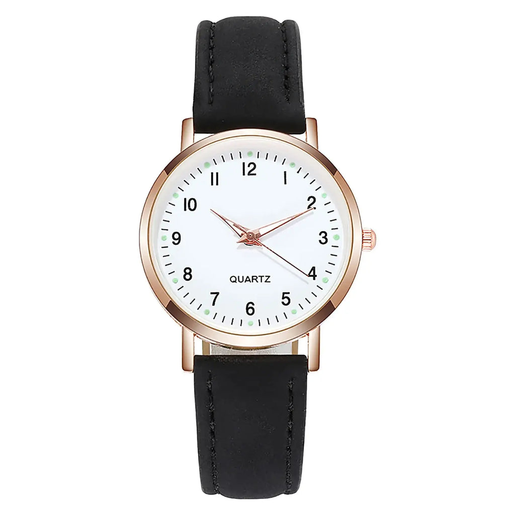 Women’s minimalist luminous quartz leather watch with rose gold case, white dial, black numerals, green markers, and black strap