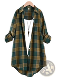 Women’s oversized cotton linen plaid button up shirt jacket in green and yellow with rolled sleeves on wooden hanger