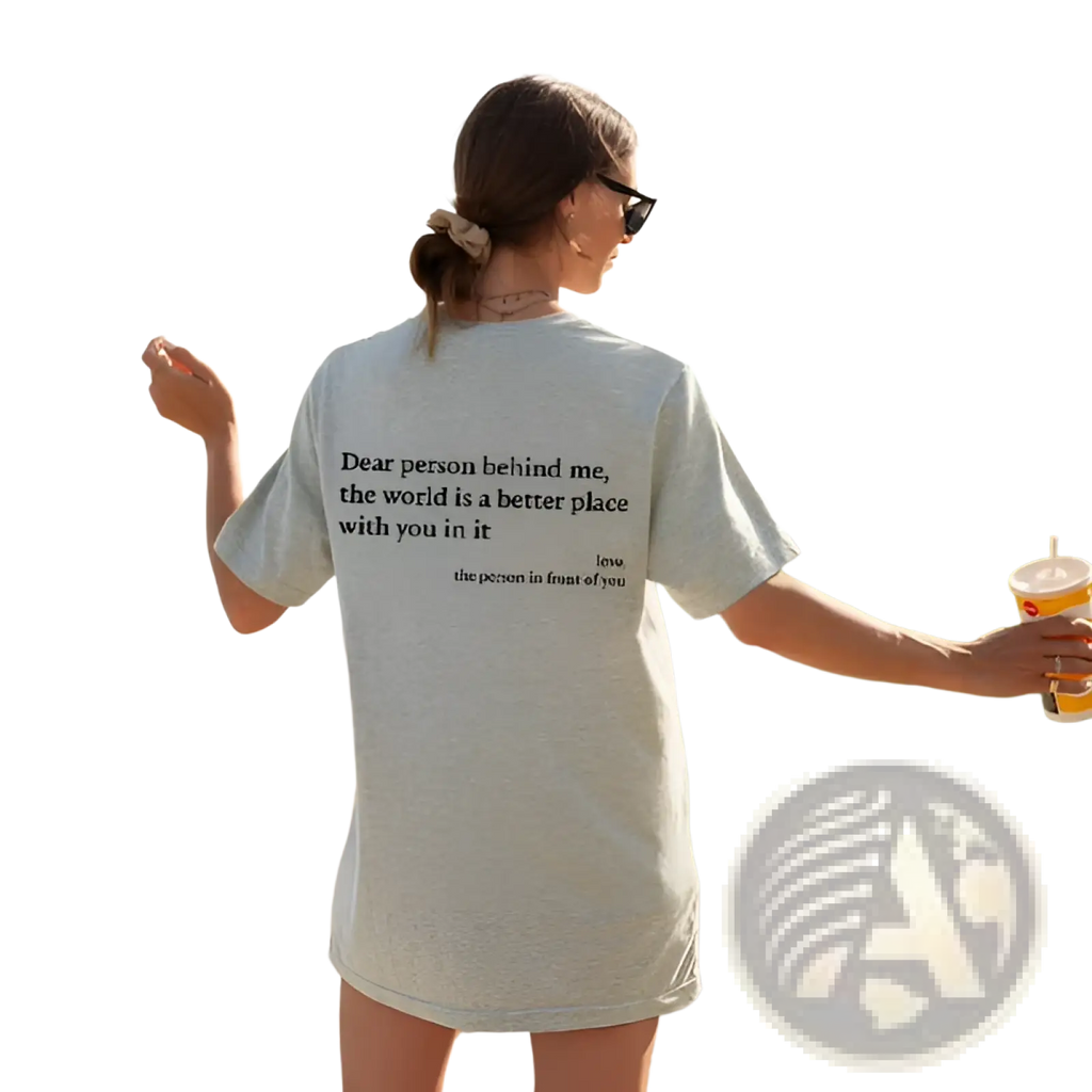 Women’s oversized light gray cotton t-shirt featuring black slogan print on the back side