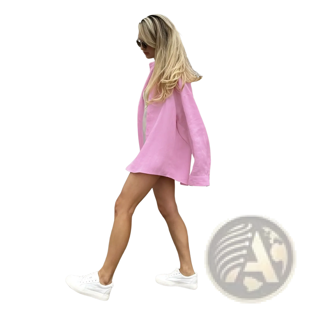Women’s oversized textured button up cardigan blouse in soft pink linen with long sleeves and asymmetrical hemline
