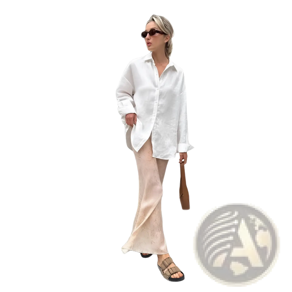 Women’s oversized white button-up cardigan blouse with subtle textured pattern in soft breathable fabric
