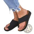 Women’s black platform thong sandals with thick rubber sole and tan insole for casual slide and beach wear