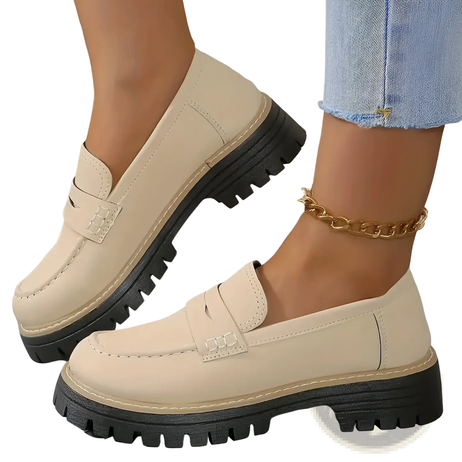 Cream-colored leather women’s platform loafers with black chunky soles and decorative toe strap for casual wear