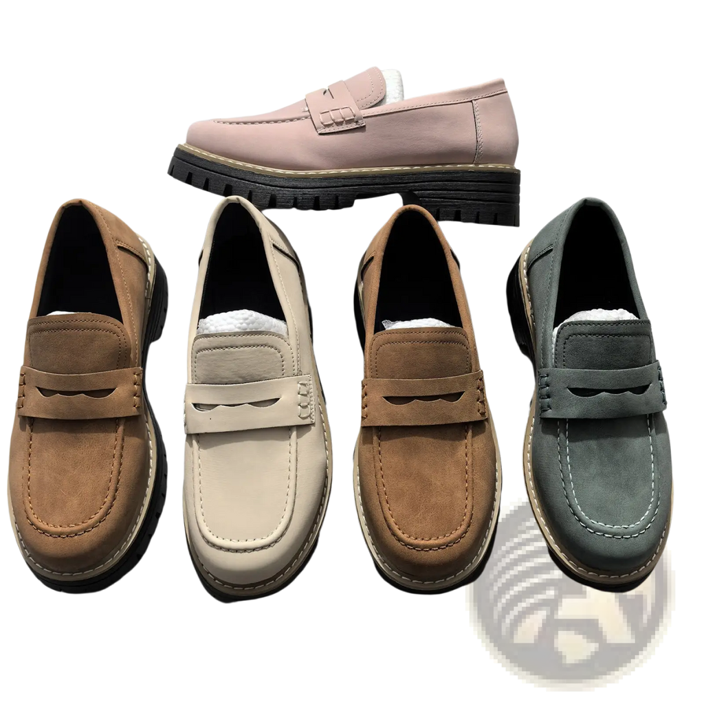 A collection of women’s platform suede loafers in pink tan beige and gray with thick black soles and decorative stitching