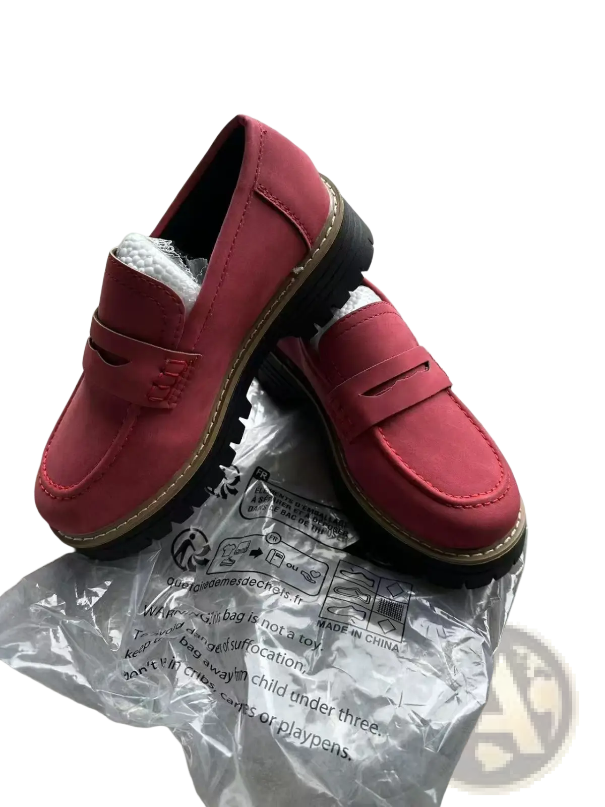 Women’s platform suede loafers in red with black rubber soles and tan stitching for casual wear