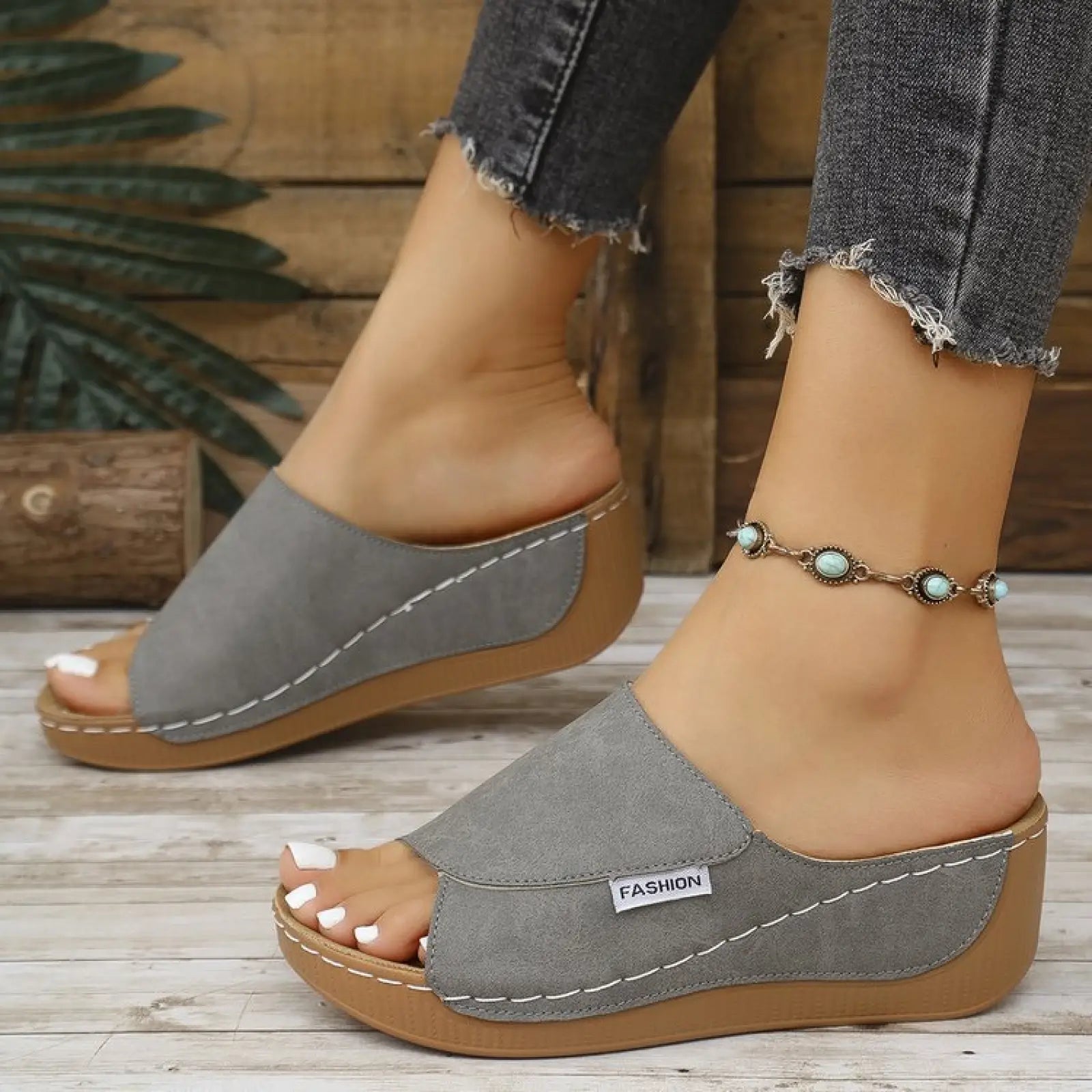 Women’s platform wedge summer slide sandals in gray suede with white stitching and tan rubber sole