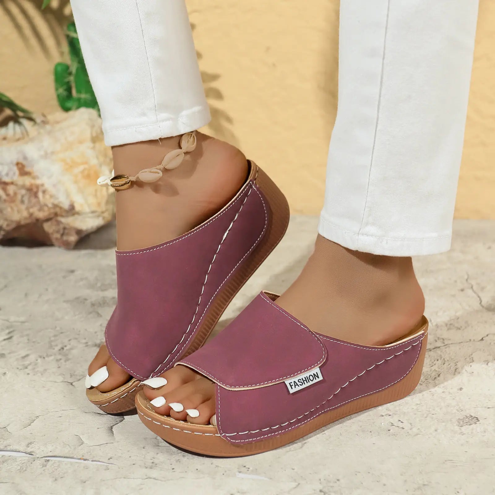 Purple women’s platform wedge summer slide sandals with white stitching and a fashion label on the side