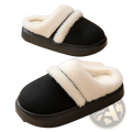 Black slip-on women’s plush suede winter house slippers with white faux fur lining and thick rubber sole