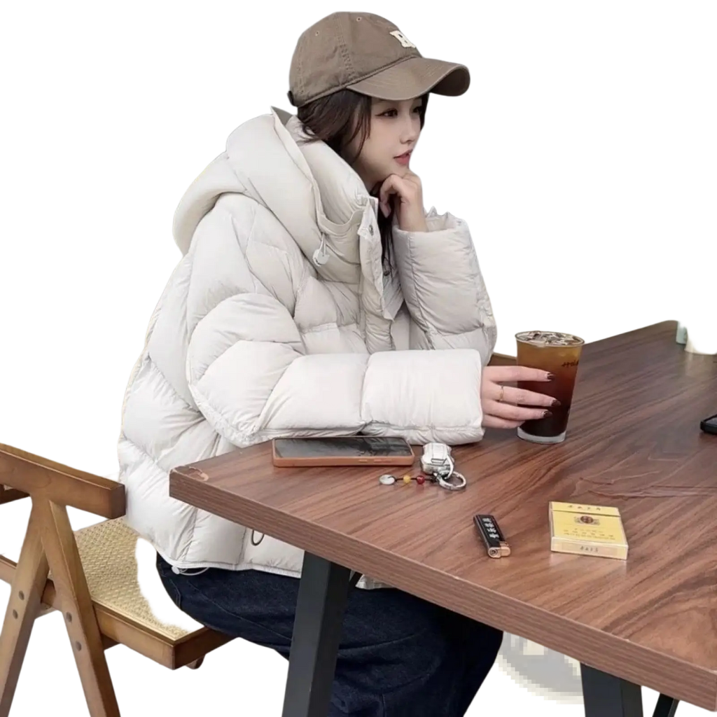 A cozy off-white puffer jacket with high collar and quilted design for women’s winter wear
