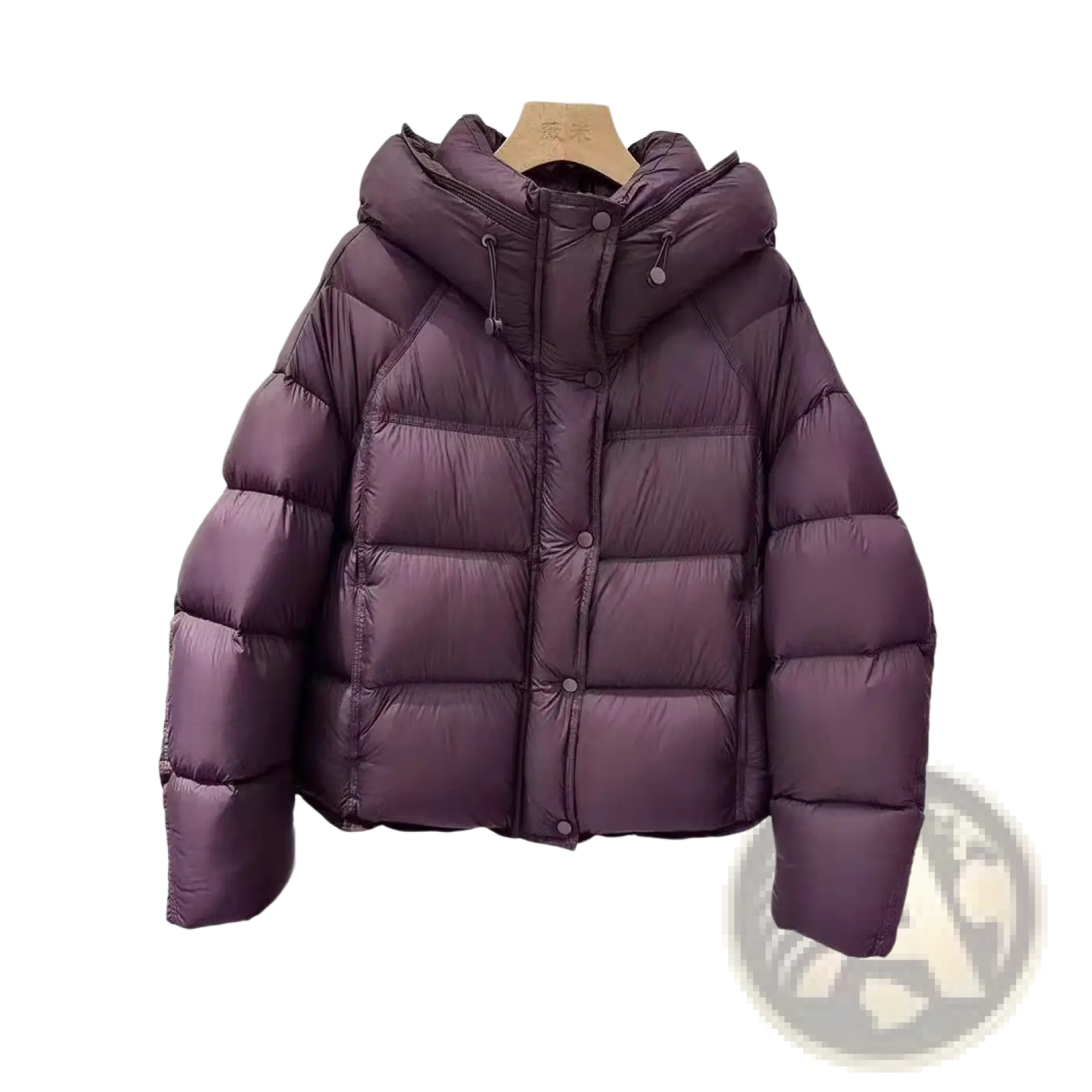 A plush purple quilted down winter jacket for women with a hood and button closure for cold weather use
