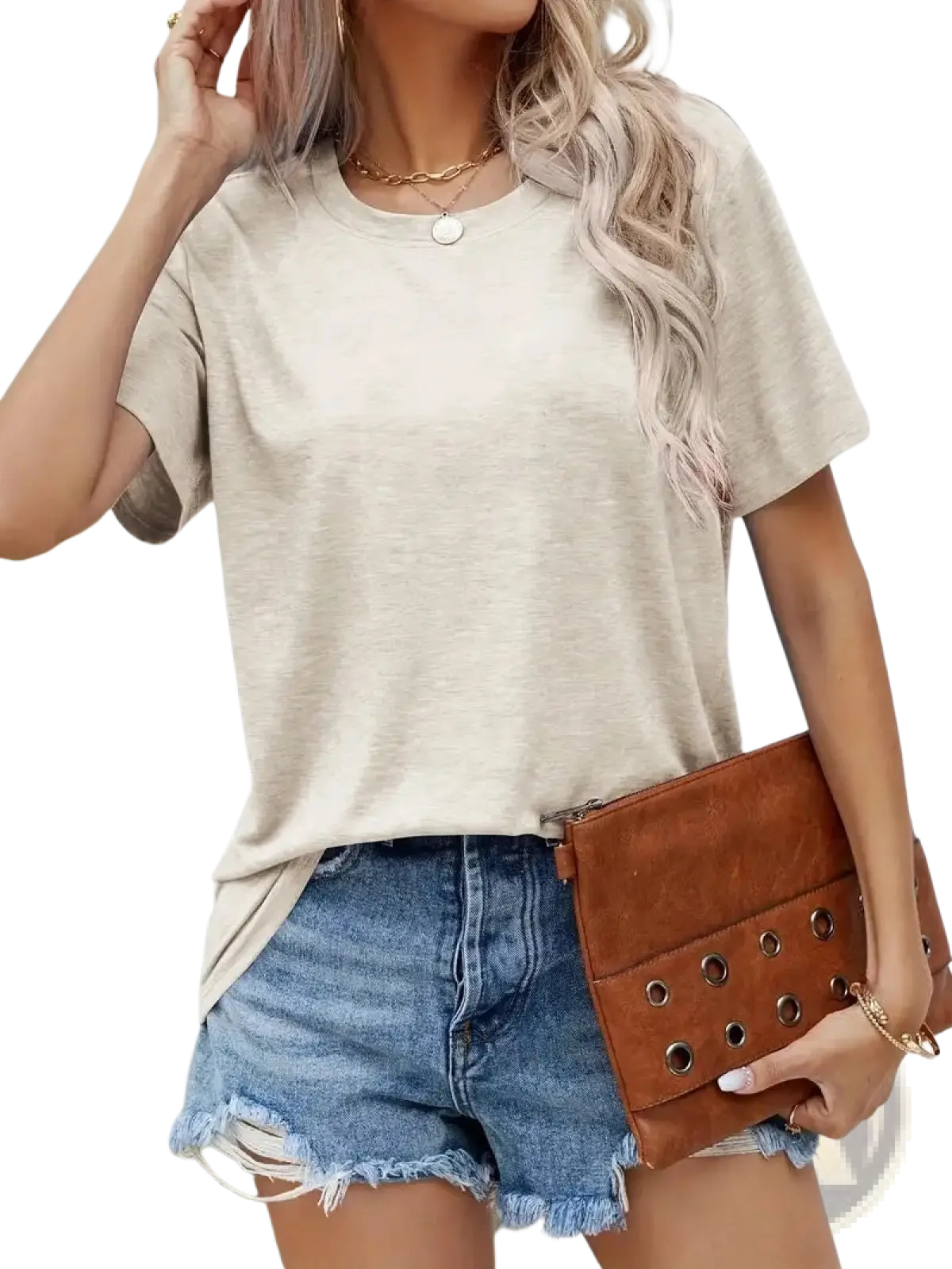 Brown leather clutch with metal grommets paired with women’s relaxed fit korean minimalist cotton t-shirt
