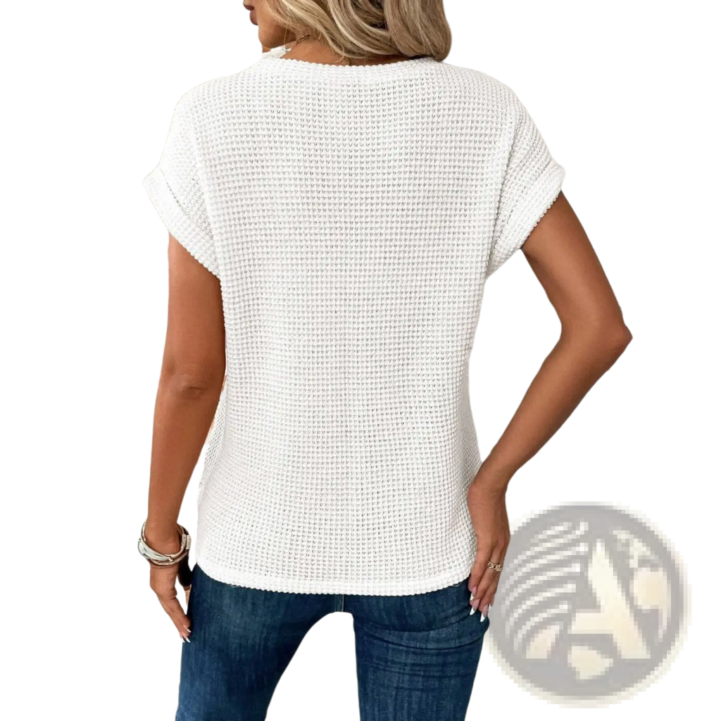 Women’s relaxed fit waffle knit short sleeve top in white with a rounded neckline and soft textured fabric