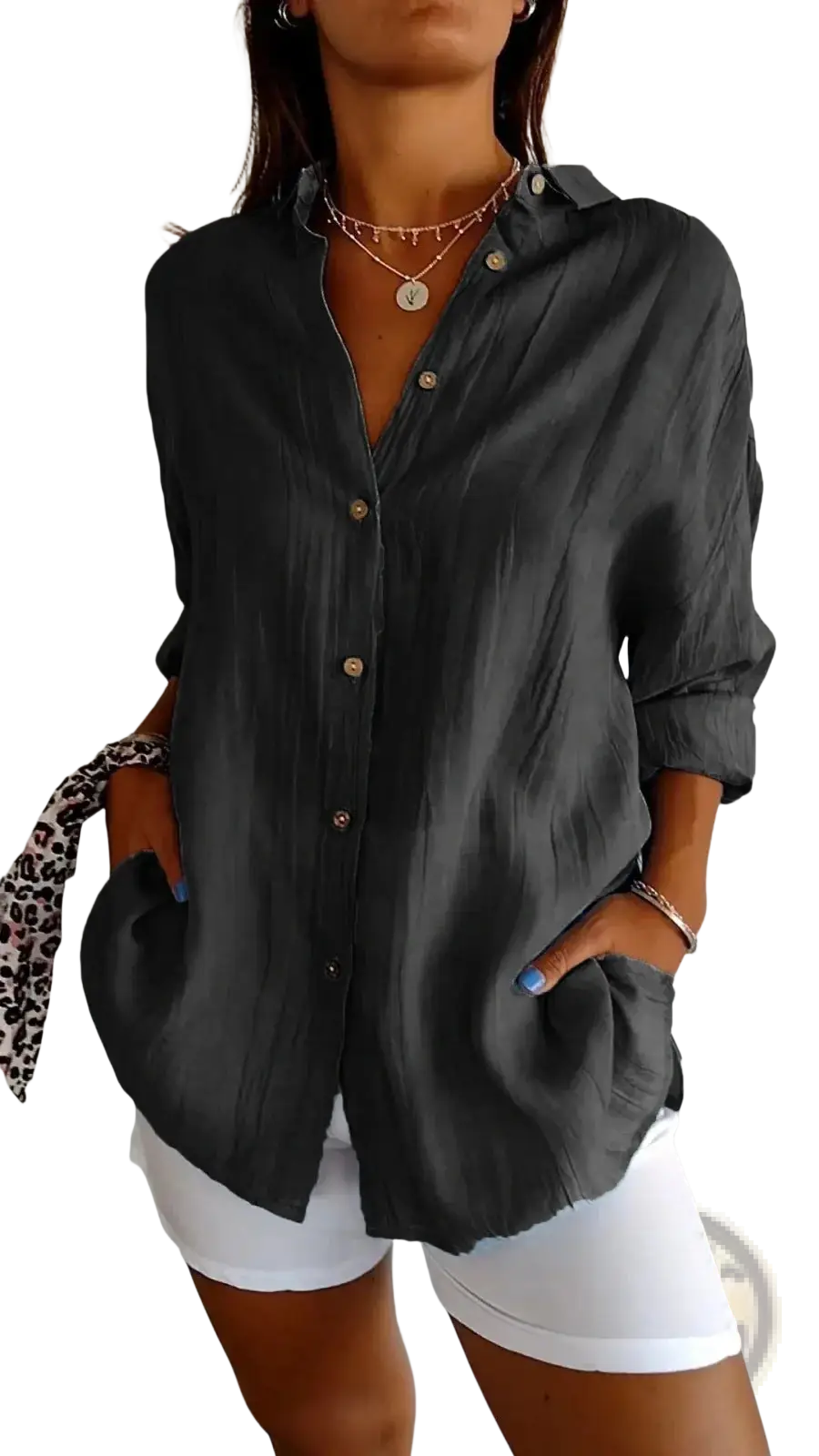 Black women’s relaxed pleated button-up shirt made of lightweight fabric with rolled sleeves for casual wear