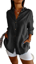 Black women’s relaxed pleated button-up shirt made of lightweight fabric with rolled sleeves for casual wear