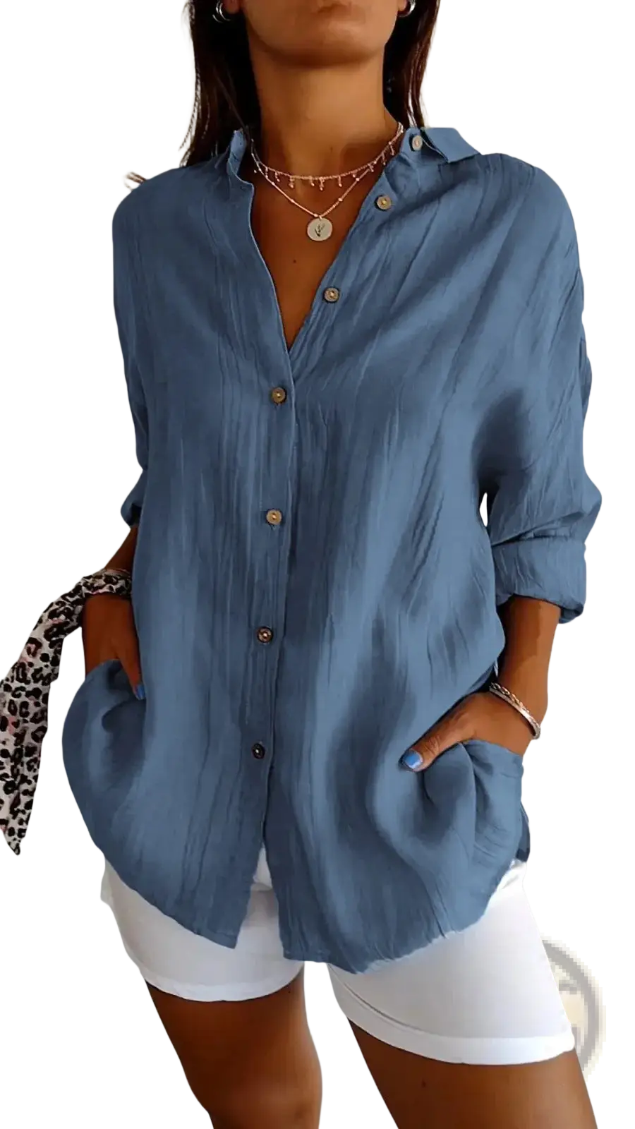 Women’s relaxed pleated button up shirt in soft light blue with rolled sleeves and a relaxed fit, ideal for casual wear